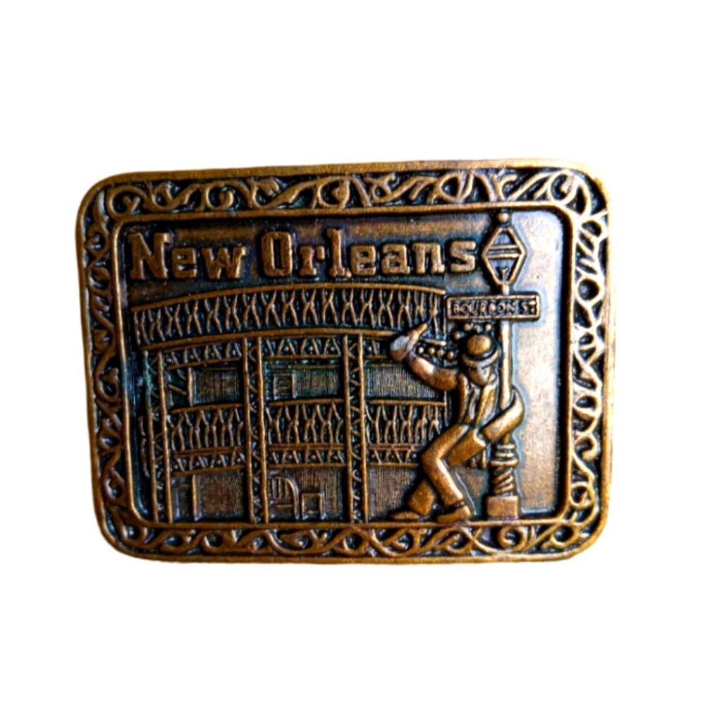 Rare New Orleans belt buckle cheers Mardi Gras